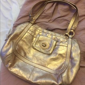 Roes gold couch purse